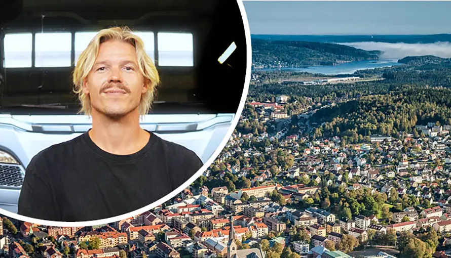 En person med blont hår och svart tröja. Flygfoto över stadslandskap på byggnader och blå himmel.